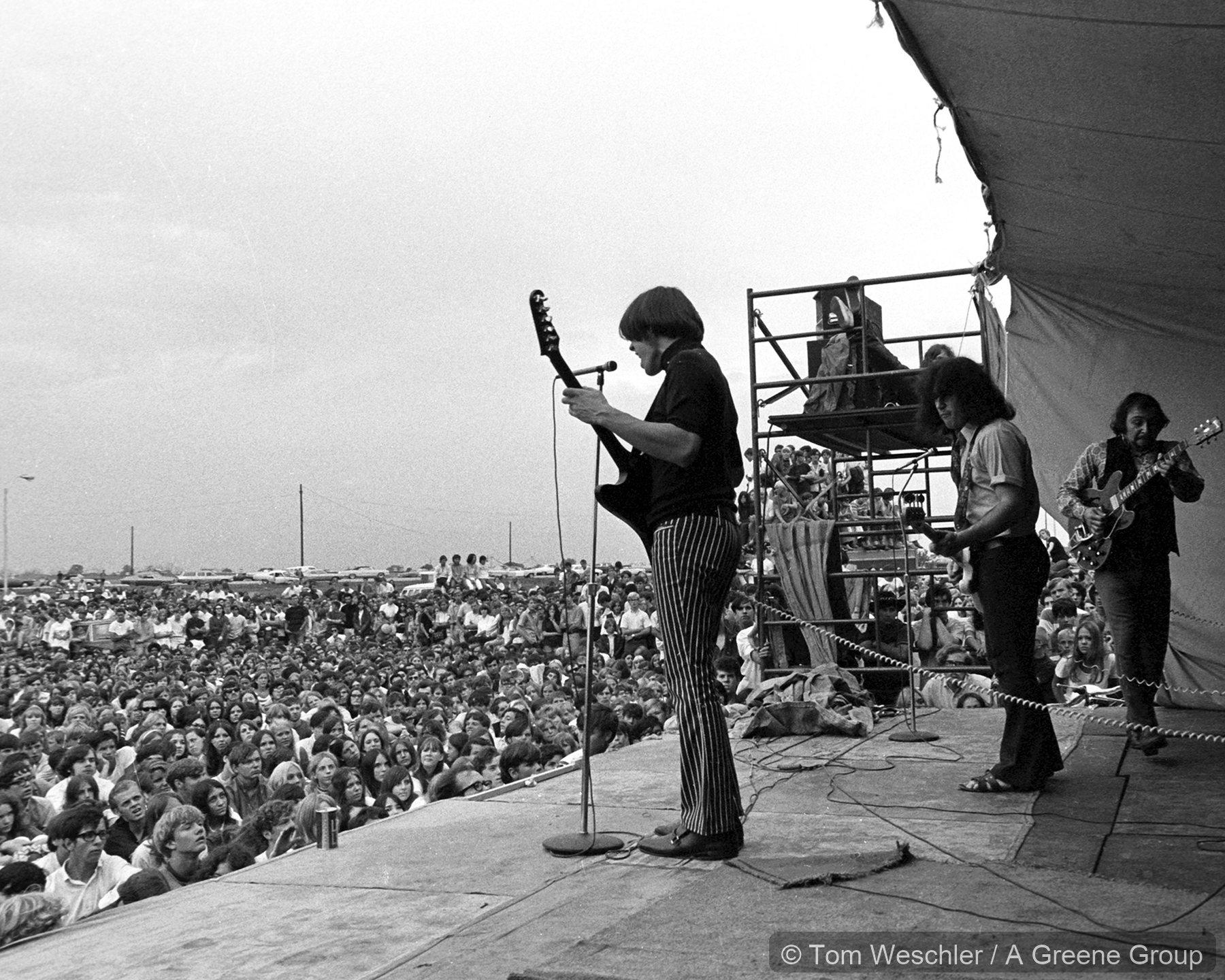 Bob Seger System performing on an outdoor stage at Oakland Mall in 1969